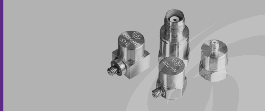 Close up show of accelerometers in black and white on grey background